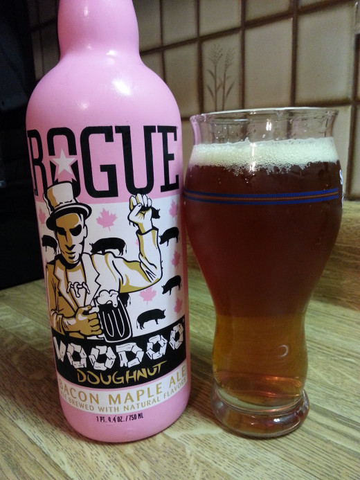Poured pint of Rogue Voodoo Doughnut Bacon Maple Ale