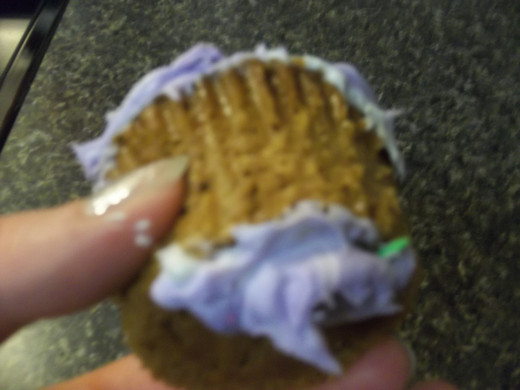 Frost the bottom of the cupcake.