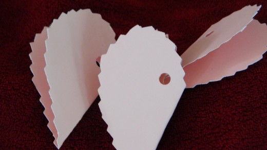CUT OUT LITTLE HEARTS TO TURN INTO YOUR COUPON BOOKLETS