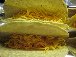 Cheese in bottom of taco