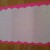 Here, the scallops are cut and the paper is placed on a bright color so you can see the edge's design. Note that the scallops do not have to perfect. Here, the scallops are cut and the paper is placed on a bright color so you can see the edge's design. Note that the scallops do not have to perfect.