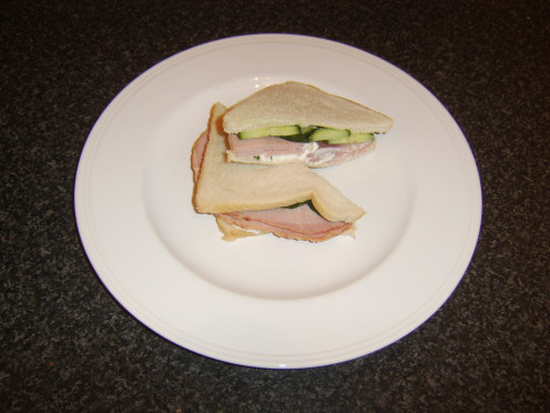 Cucumber, thick slices of honey roast ham and cottage cheese with onion and chive is just one of the cucumber sandwich recipe ideas featured on this page