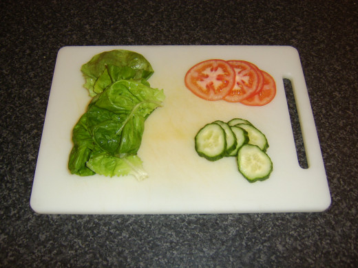 Lettuce, cucumber and tomato prepared for sandwich