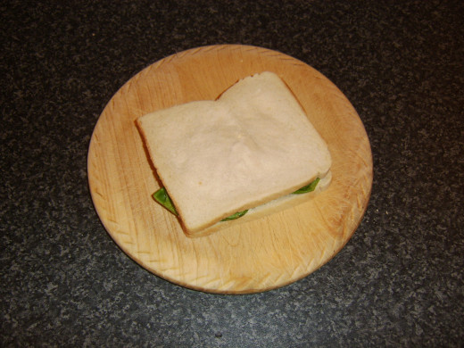 Cucumber, lettuce and tomato sandwich is complete