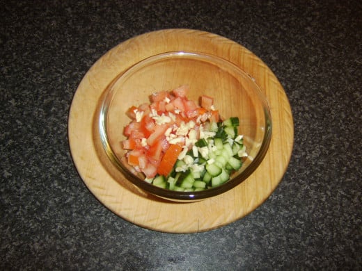 Combining the cucumber salsa ingredients