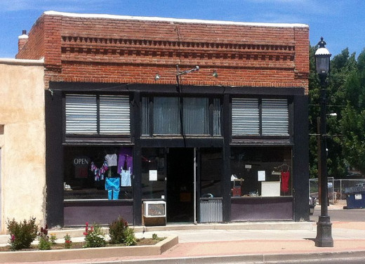 Ian Poellet photographed the historic Aztec Motor Company Building, located at 301 South Main Street in Aztec, New Mexico on June 1, 2012. The building is listed on the US National Register of Historic Places.
