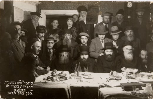 One-of-a-kind unique rare photo taken at my granny's house celebrating the completion of reading from the Torah 'a-page-a-day'. My granny and mom are standing at the back. In the front, on the extreme right is World renowned Rabbi Aharon Kotler.  