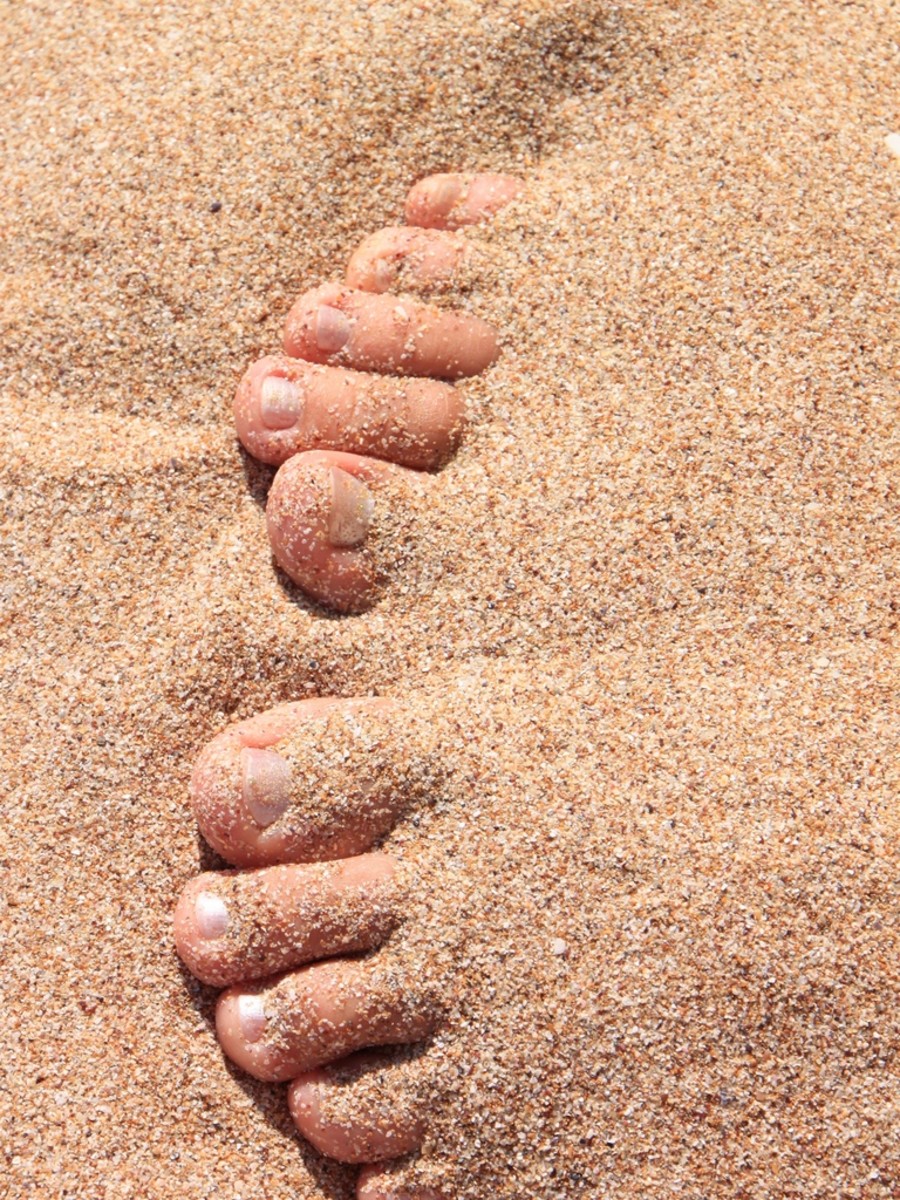 a good walk on the beach in the sand is naturally exfoliating the feet without you realizing it.