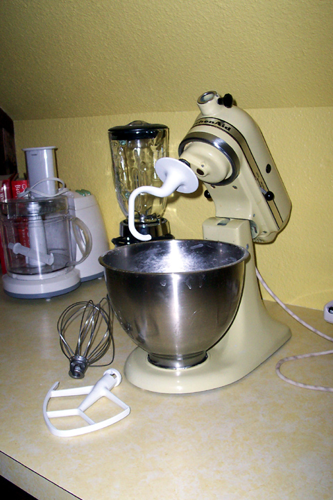 Kitchenaid - Now there's a man's mixer. Only thing better is a silver one with black trim.