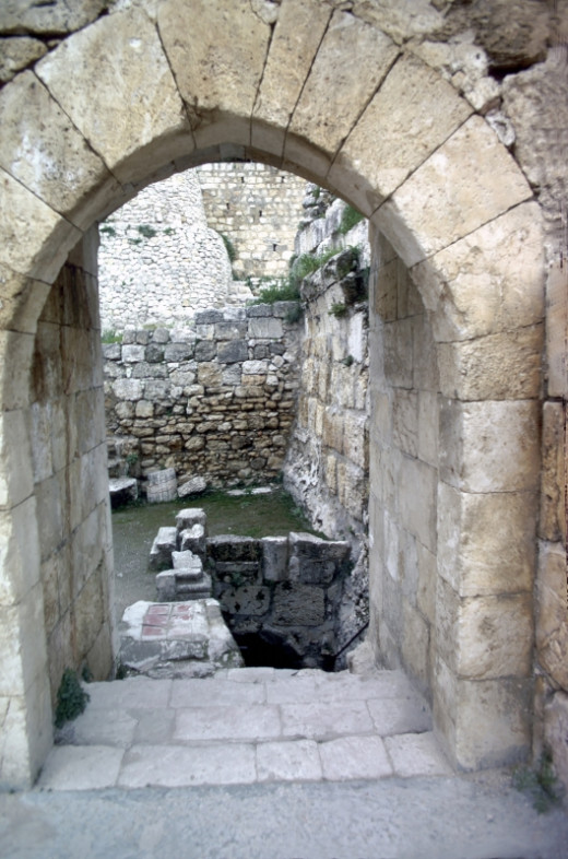 A stone arch at the ruins of the Pool of Bethesda in Jerusalem, where Jesus healed a lame man.