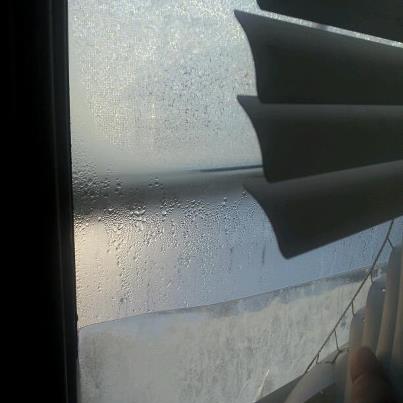 Shut both window panes to cut heating costs. Note the ice formed from the condensation on the inside of the window. This is NOT efficient.