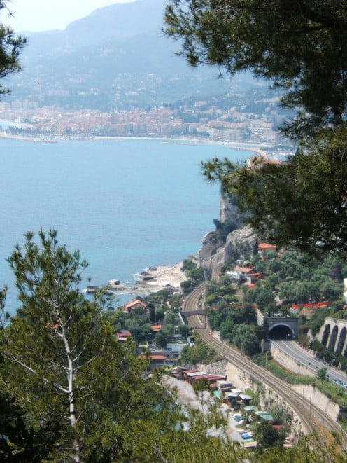 France viewed from Grimaldi, Italy. In the background may be seen the city of Menton and its Old Port (to the left of the photo). 