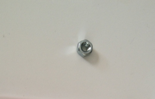 Thread size of a standard tripod is 1/4" 20 