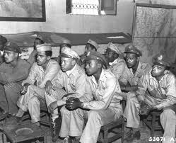 While some outgroup members remained as inconspicuous as possible,others fought against the blatant discrimination,asserting themselves to be just as equal as ingroup membersTuskegee Airmen of World War II, excellent pilots. 
