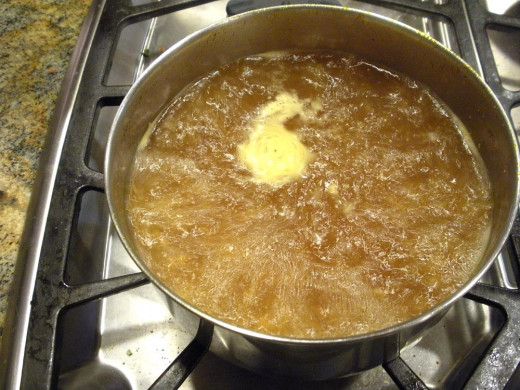 Bring to a rolling boil, and boil for a minute or so.  Now is when you want to stir and scrape.