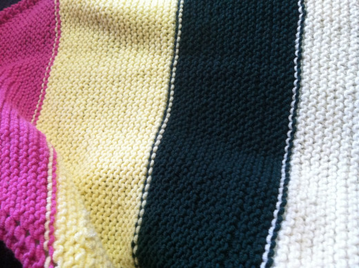 The wrong side of the blanket.