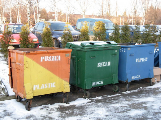 A perfectly good cardboard box next to the dumpster. 
