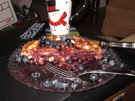 14. Delicious Blueberry Waffles with Organic Blueberry Syrup and butter and more blueberries...  Feel good food