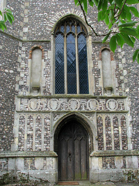The church of St John the Baptist, Coltishall - west doorway.