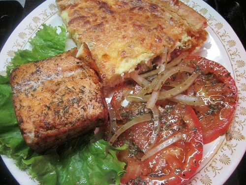 Quiche, salmon and salad dinner