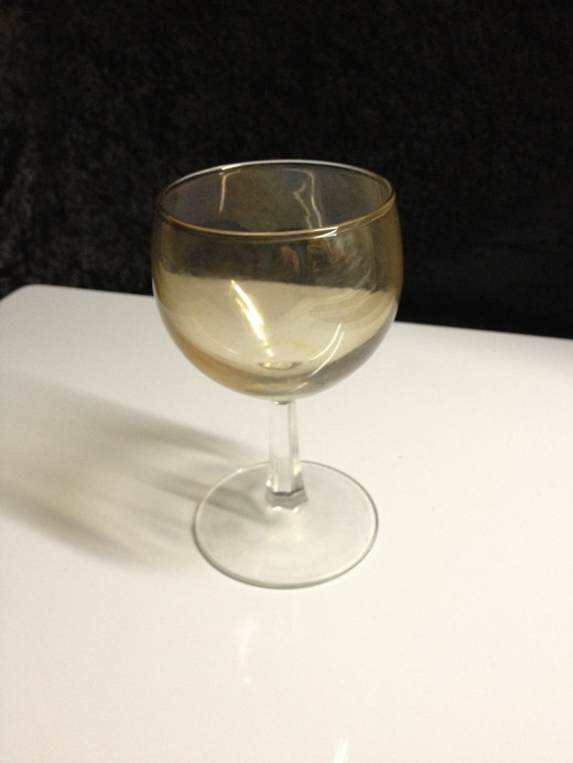 I used an old wineglass- recommend NOT using the good ones