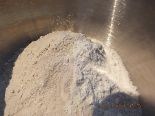 All the dry ingredients are in, Now take it over to the stand mixer or whisk by hand.