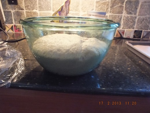 The overnight stay allows the dough to develop deeper flavors. It's getting ready to be transformed into a roll.