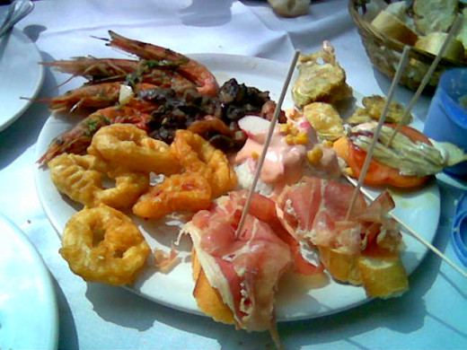 Spanish Tapas - many small plates of delicious different foods. Ideal for sharing!