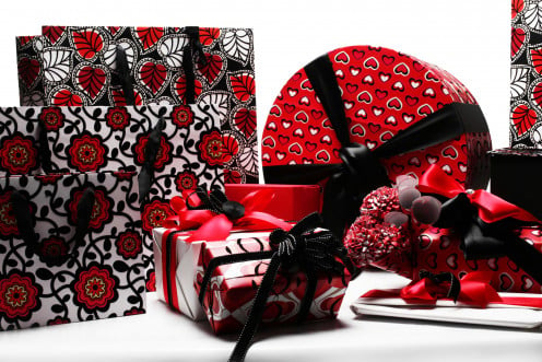 Wrap the gift neatly in fresh paper or gift bags.