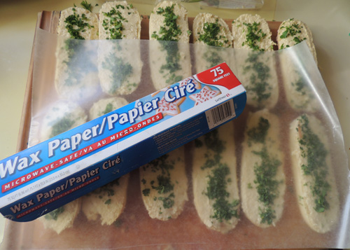 Press herbs into butter gently using wax paper, to prevent sticking