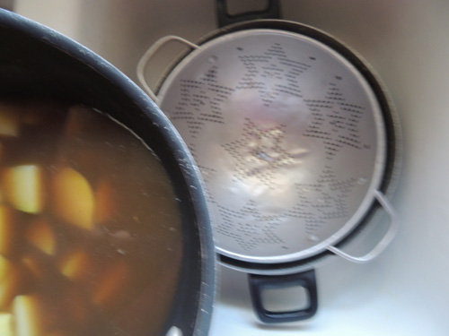 Drain potatoes, and reserve cooking broth in separate pot.