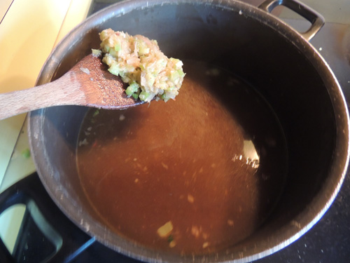 add shallots & celery mixture to reserved cooking stock. Add Bay leaves. Return to heat. Stir thoroughly, and leave be for a second.