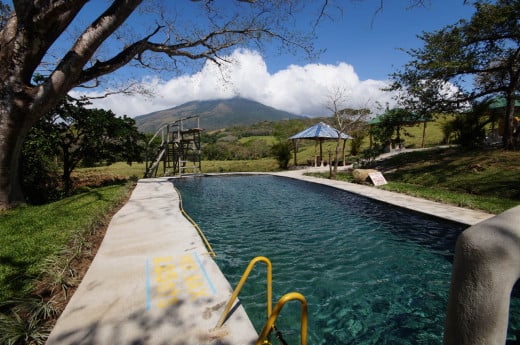 The warm water swimming pool at El Guyacán that has a million-dollar view of Volcano Miravalles.