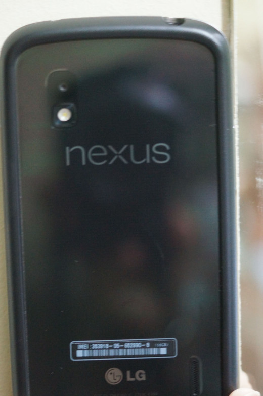 The Nexus 4 phone, showing the logo, LED flash bulb and the 8 MP camera with is the subject of this review.