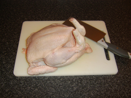 A cleaver is the best tool for removing the backbone from a chicken