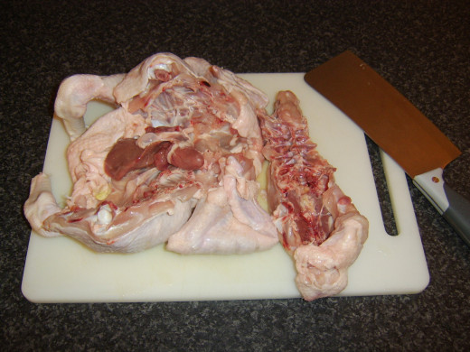 Backbone is removed from whole chicken