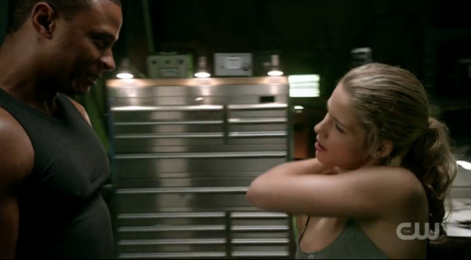Diggle and Felicity are getting their sweat on.