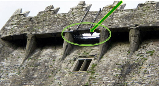 The Blarney Stone is attached to the underside of the battlements and held in place by the two iron bars, shown here. 
