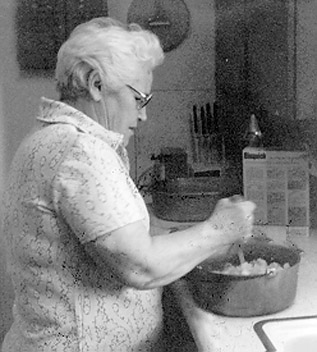 My Honeymama at the stove making something wonderful.