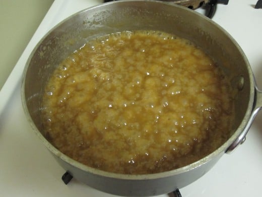 Further cooking - with constant stirring - will bring together the butter and sugar into this thick bubbly mixture.