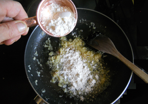 add flour, cook until warm, bread-y smell emanates