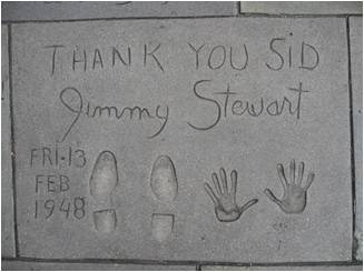 Grauman's Theater in Hollywood with Jimmy Stewart's hand and footprints