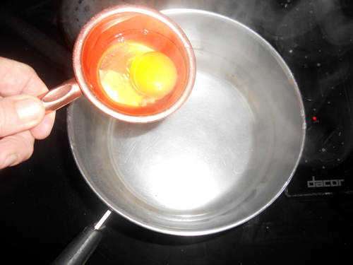 a dash of white vinegar helps the eggs not stick 