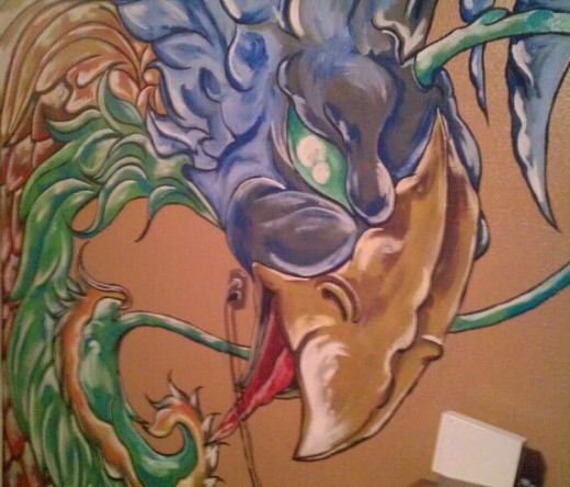 Jeremiah's art is done on walls.  Amazing detail in such large scale.  This is a blue phoenix.  My spirit when calm.
