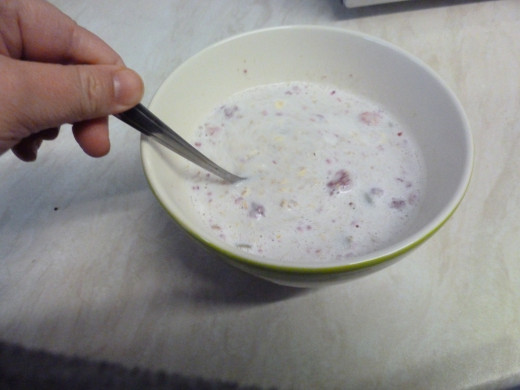 1. Add the milk to the rolled oats, and stir.  Microwave on full power for 2 minutes.