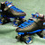 A pair of quads skates. Most professional skaters take off the brakes that are in the front.