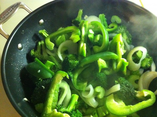 Add the sliced green pepper