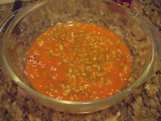 Combine rinsed quinoa, celery and 1 cup carrot juice in a 2 quart glass bowl with lid.
