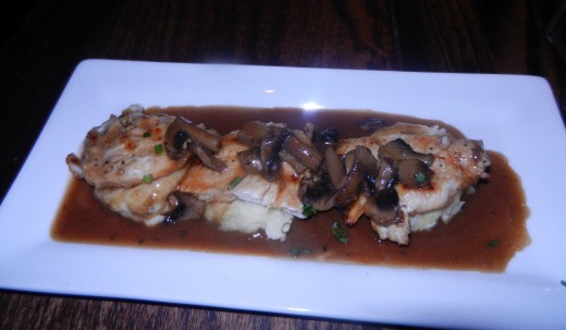 Pollo Oloroso: Grilled chicken breast with Oloroso sherry mushroom sauce and manchego cheese mashed potatoes