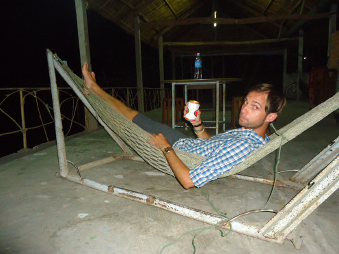 Relaxing in a hammock with a Saigon beer